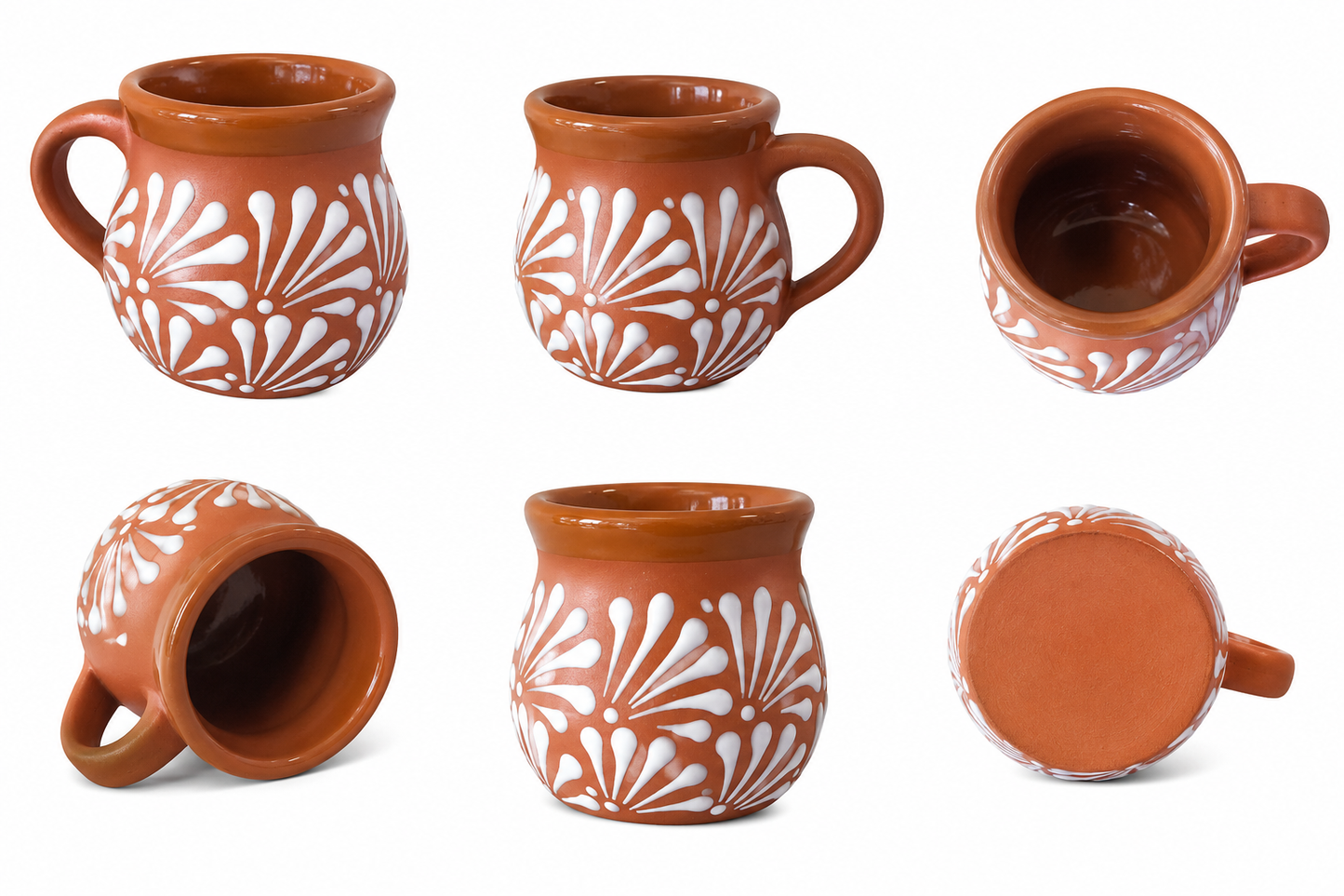Set of terracotta mugs with white floral patterns on a white background
